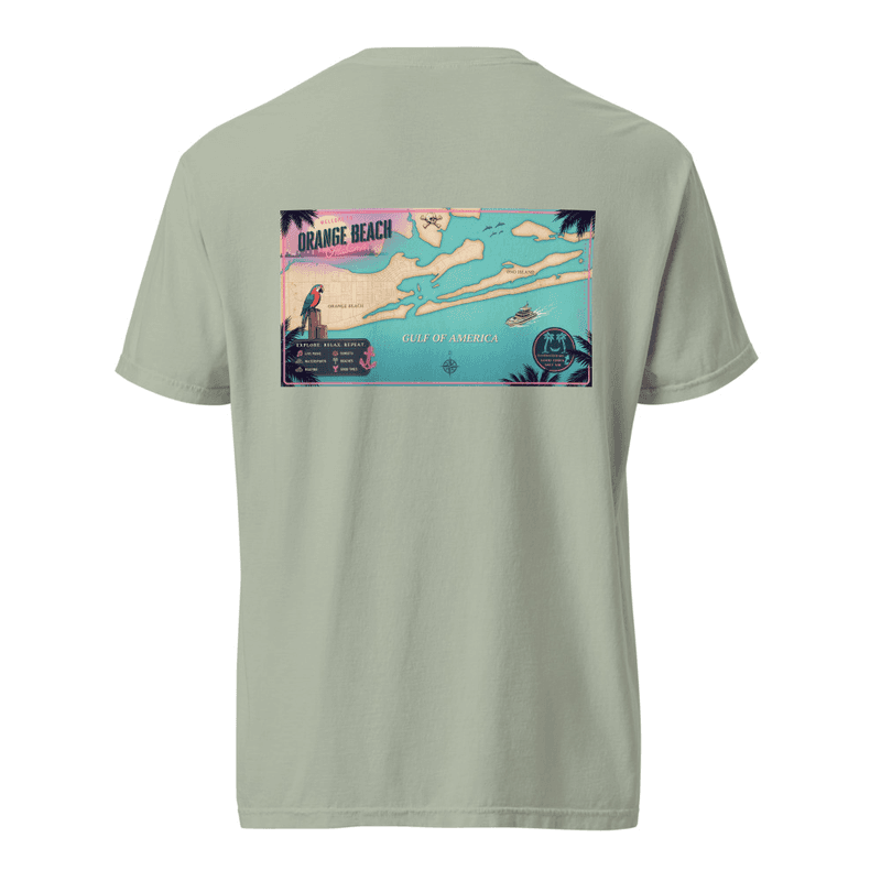 The back of a garment-dyed tee printed with a retro neon postcard map of Orange Beach, Alabama — turquoise water, cream barrier islands, palm silhouettes and a sunset sky