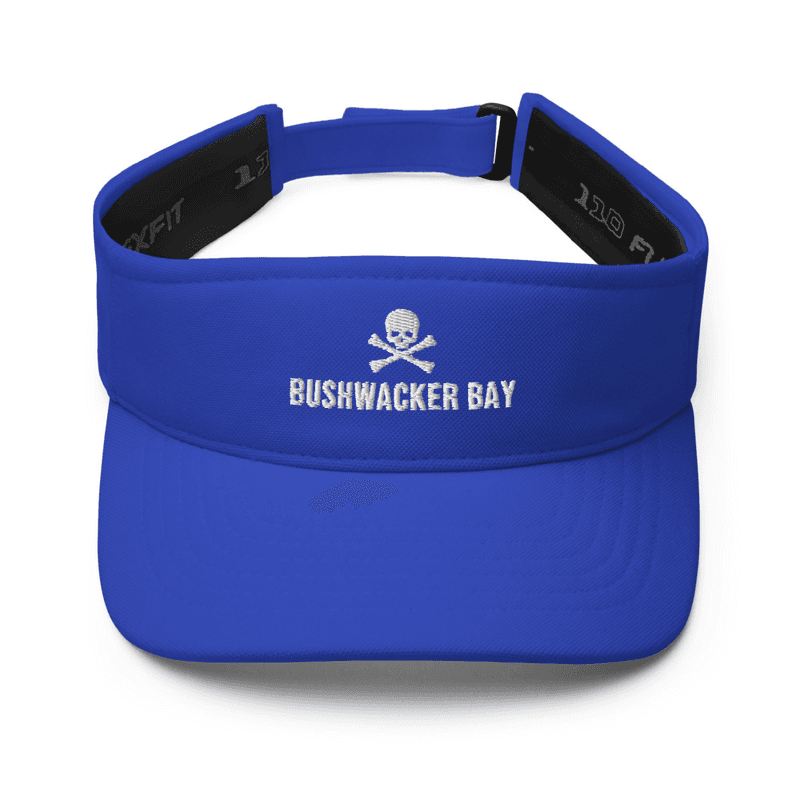 An embroidered skull and crossbones with the Bushwacker Bay wordmark beneath it, stitched in cream thread