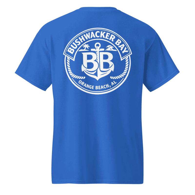 A tee printed with the Bushwacker Bay anchor crest — a double B monogram over an anchor inside a rope ring, with Bushwacker Bay arched above and Orange Beach, AL beneath