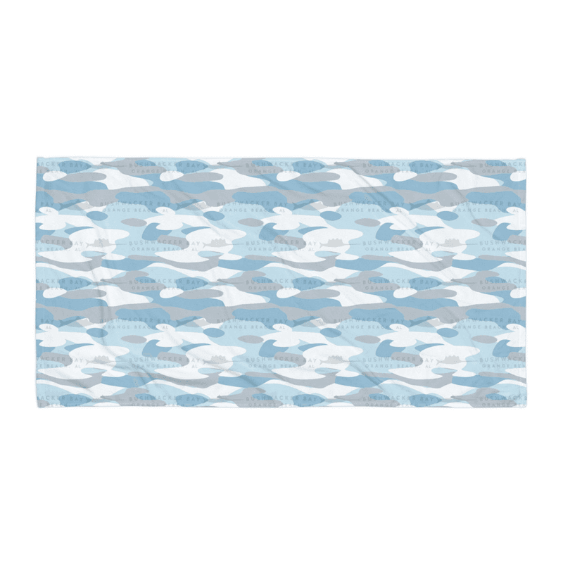 A beach towel printed edge to edge with light blue-water camo and subtle billfish silhouettes