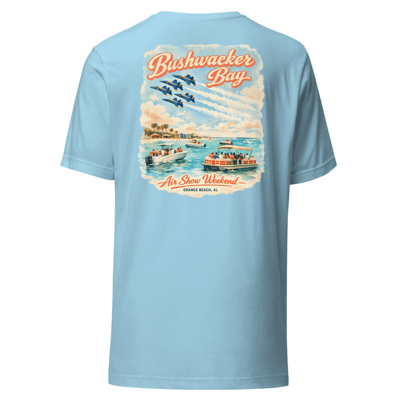 A tee with a retro travel-poster back print of boats rafted up in turquoise water off Orange Beach, jets in formation overhead trailing contrails